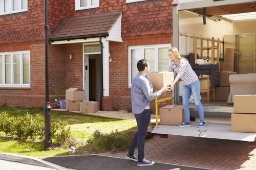Professional packing services in West Drayton preparing household items for a move
